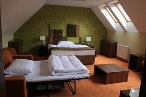 Ένα ή περισσότερα κρεβάτια σε δωμάτιο στο Hotel BELASSI