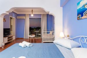 Postel nebo postele na pokoji v ubytování CHAMBRE BLEUE