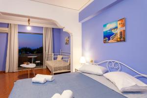 Postel nebo postele na pokoji v ubytování CHAMBRE BLEUE