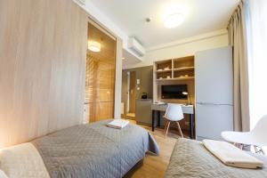 Posteľ alebo postele v izbe v ubytovaní Wolska Residence I