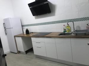 Kuchyň nebo kuchyňský kout v ubytování Villa pilonga