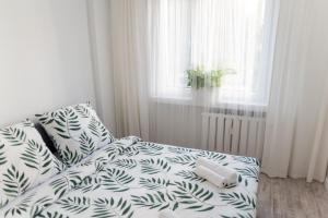 Krevet ili kreveti u jedinici u objektu Apartament BLISKO WSZĘDZIE