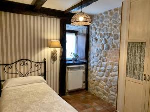 Cama o camas de una habitación en Akla La Casa Del Puente