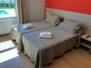 Postel nebo postele na pokoji v ubytování Hosteria de Gonzar