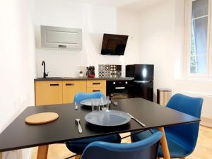 Kuchyň nebo kuchyňský kout v ubytování Superbe Appartement de 50m2