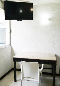 TV o dispositivi per l'intrattenimento presso Hotel Ros Gaud