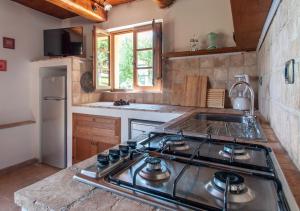 Kuchyň nebo kuchyňský kout v ubytování Agriturismo Il Poggio, Casa Rosa