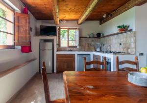 Kuchyň nebo kuchyňský kout v ubytování Agriturismo Il Poggio, Casa Rosa