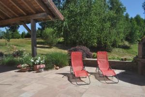 Photo de la galerie de l'établissement "La Belle Chambre" dans une ferme avec etang privé dans la région des Mille Etangs Faucogney-et-La-Mer, à Écromagny