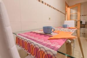 Coffee and tea making facilities at Apartamento Centro Santiago