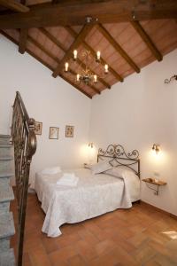 Un pat sau paturi într-o cameră la Il Gallo Nero