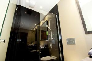 Ein Badezimmer in der Unterkunft Centro Hotel Ayun DELUXE