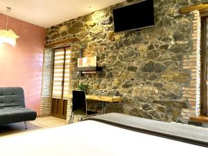 Una televisión o centro de entretenimiento en Urdaibai Etxea