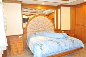 Postel nebo postele na pokoji v ubytování Suksabai Pool Villa + 5 fotografií