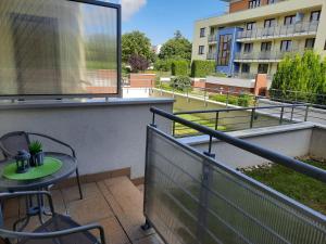 Balkón alebo terasa v ubytovaní Apartament Maja Zielone Tarasy Kołobrzeg