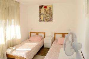 Cama o camas de una habitación en casa das pombas