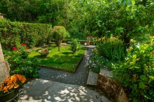 Taman di luar Gîte " LE CHEMIN VERT "