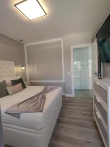 Postel nebo postele na pokoji v ubytování Suite Ruidera Beach