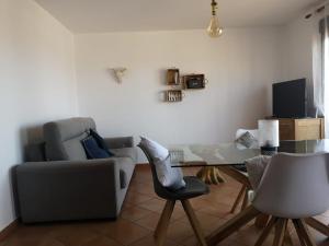 A television and/or entertainment centre at Sun Villa & exclusive stars view