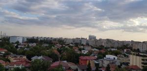 a view of a city with houses and buildings at New Green Apartment Studio 1 in Bucharest