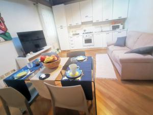 A kitchen or kitchenette at Romantic Sky Apartment