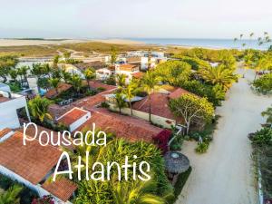 an aerial view of a resort with the words puerto arenas at Pousada Atlantis in Jericoacoara