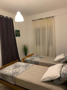 Posteľ alebo postele v izbe v ubytovaní Lucas Lux Flogita apartment