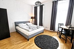 Ein Bett oder Betten in einem Zimmer der Unterkunft Vienna Vision Apartment inkl. Netflix!