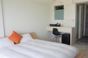 Postel nebo postele na pokoji v ubytování BEACH FRONT VILLA
