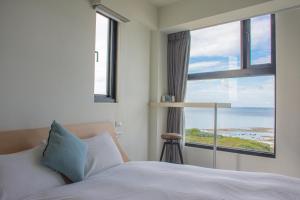 Postel nebo postele na pokoji v ubytování BEACH FRONT VILLA