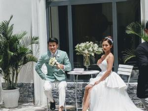a man and a woman sitting at a table at MOMALI Hotel Ninh Binh in Ninh Binh +55 photos