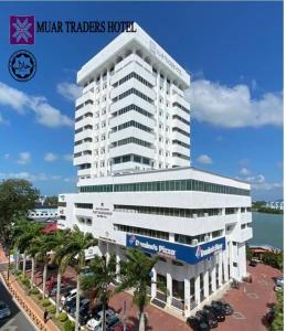 a rendering of a large white building at Muar Traders Hotel in Muar