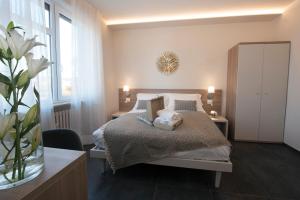 Postel nebo postele na pokoji v ubytování Brichett Deluxe Rooms