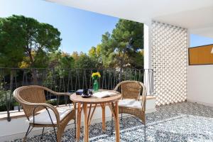 A balcony or terrace at Hotel Araxa - Adults Only