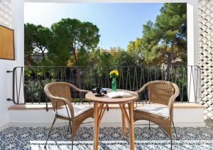 A balcony or terrace at Hotel Araxa - Adults Only