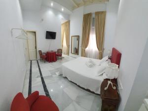 Posteľ alebo postele v izbe v ubytovaní Apartamento Tendillas