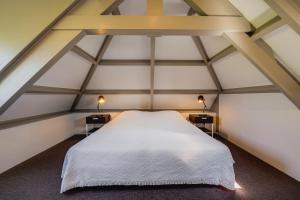 Postel nebo postele na pokoji v ubytování Villa Magnolia