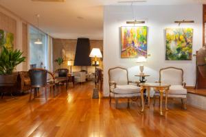 A seating area at Hotel Araxa - Adults Only