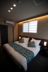Hotel Sengokuhara 533客房内的一张或多张床位