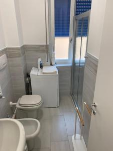 Kúpeľňa v ubytovaní Stadio 1 - Appartamenti monolocali con bagno privato Verona