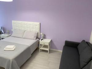 Posteľ alebo postele v izbe v ubytovaní Stadio 1 - Appartamenti monolocali con bagno privato Verona
