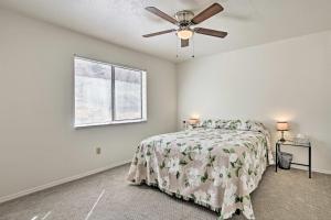 a bedroom with a bed and a ceiling fan at Moms Place in Jemez - 1 Mi to Hot Spring in Jemez Springs