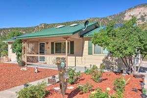 a small house with a landscaping in front of it at Moms Place in Jemez - 1 Mi to Hot Spring in Jemez Springs
