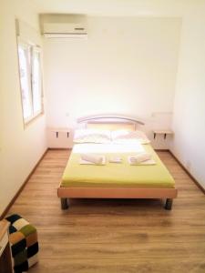 Postel nebo postele na pokoji v ubytování Maja rooms