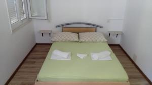 Postel nebo postele na pokoji v ubytování Maja rooms