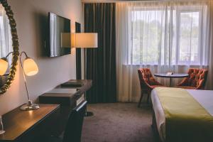 TV a/nebo společenská místnost v ubytování Hotel Kilmore