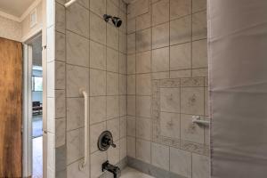 a bathroom with a shower with a bath tub at Walk to Watson Lake Private Prescott Home! in Prescott
