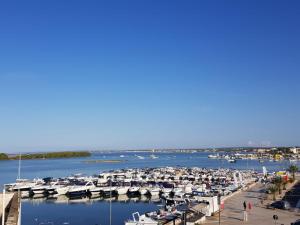 a bunch of boats docked at a marina at Onda B&B in Porto Cesareo