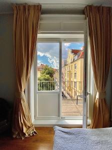 Postel nebo postele na pokoji v ubytování Das Nikolai Hotel
