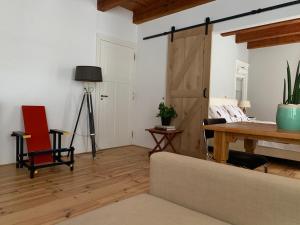 Posezení v ubytování "De Walvisch", appartement in authentieke boerderij